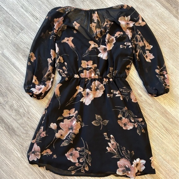 Pretty floral dress. Sheer with tank liner. Tassel details. Elastic waistband. - Picture 5 of 13